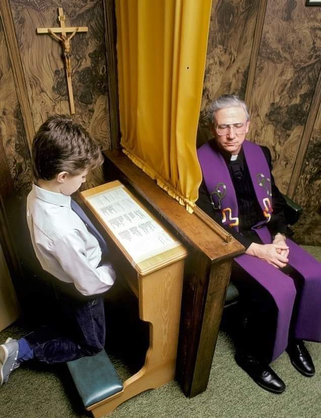priest at confessional
